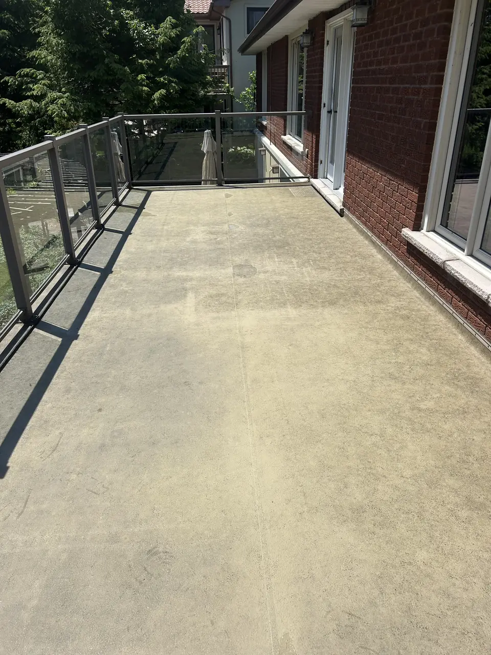 Concrete balcony after pressure washing in Kingston